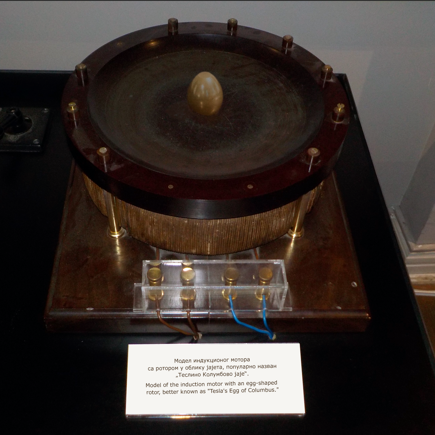Tesla's Egg of Columbus Tesla's Egg of Columbus was a device exhibited in the Westinghouse Electric display at the 1893 Chicago World's Columbian Exposition to explain the rotating magnetic field that drove the new alternating current induction motors designed by inventor Nikola Tesla by using that magnetic field to spin a copper egg on end